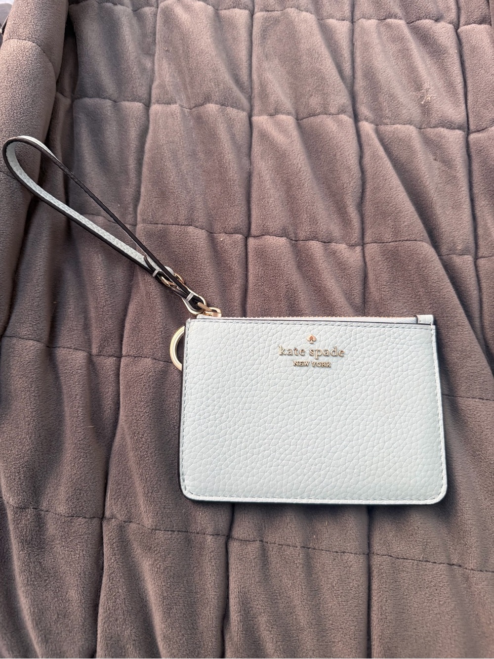 kate spade light blue Pebbled Leather Wristlet with Gold Logo
